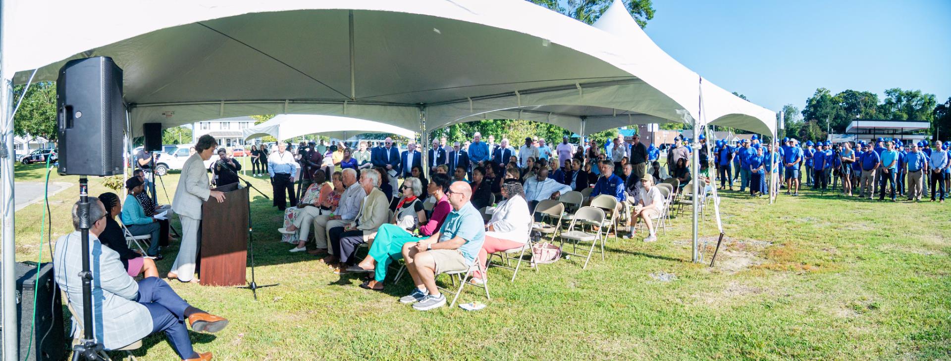 A side view of the speaker and the crowd with PCC president Dr. Maria Pharr at the podium.