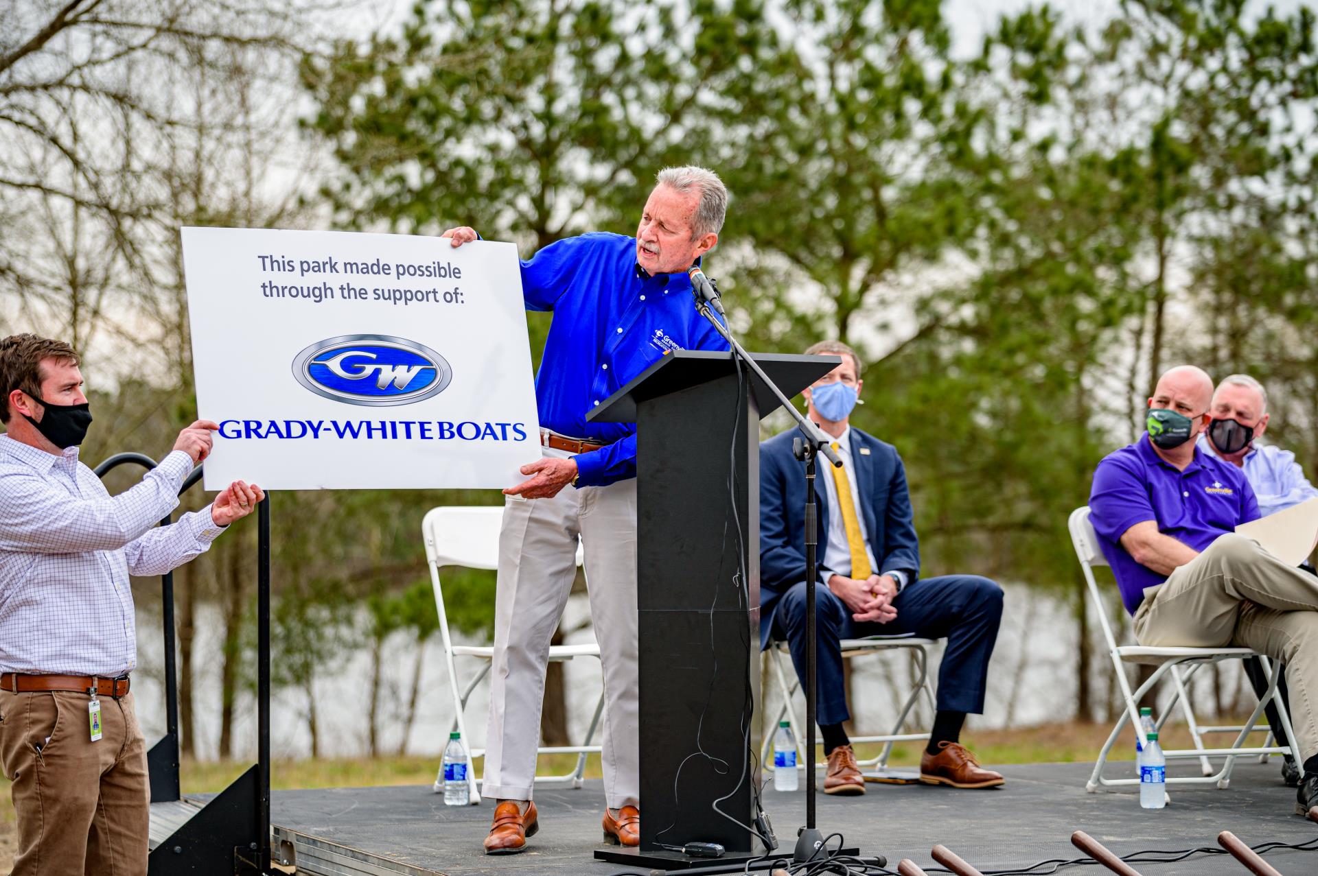 Gary Fenton unveiling Grady White sign at Wildwood