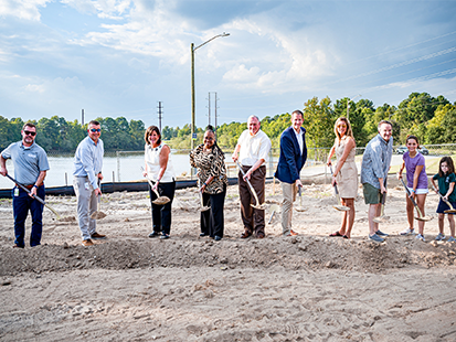 Group with shovels at groundbreaking