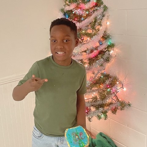 Christmas Story Time boy and cookie