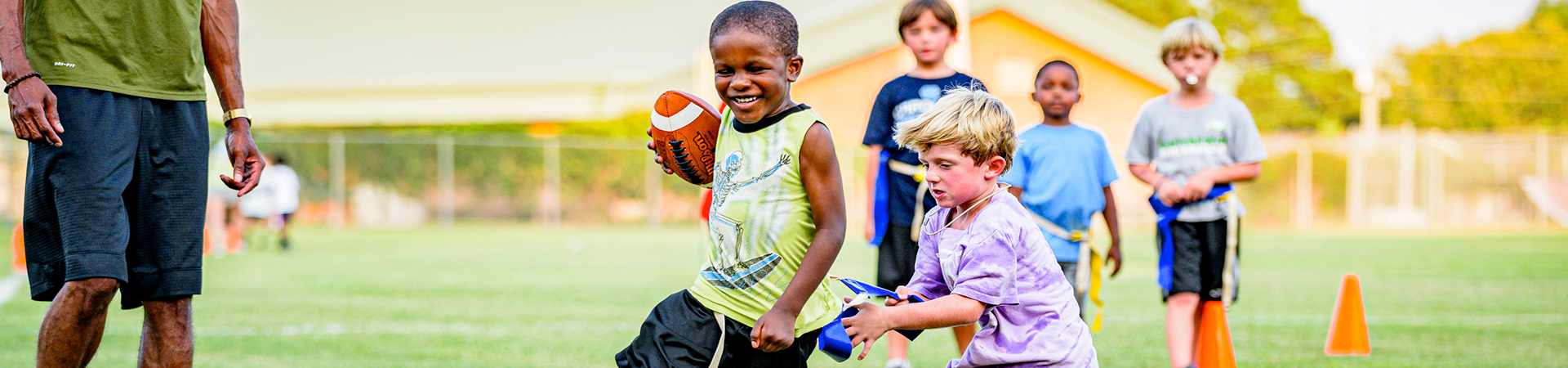 boys playing flag football