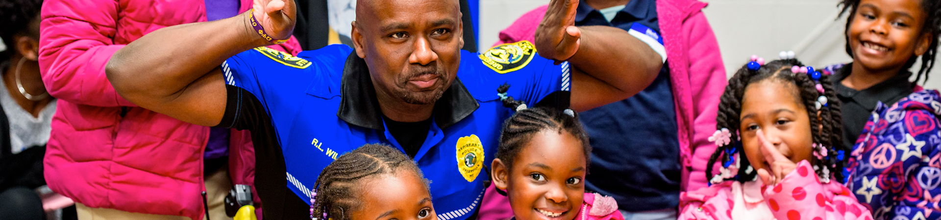 Police officer with kids