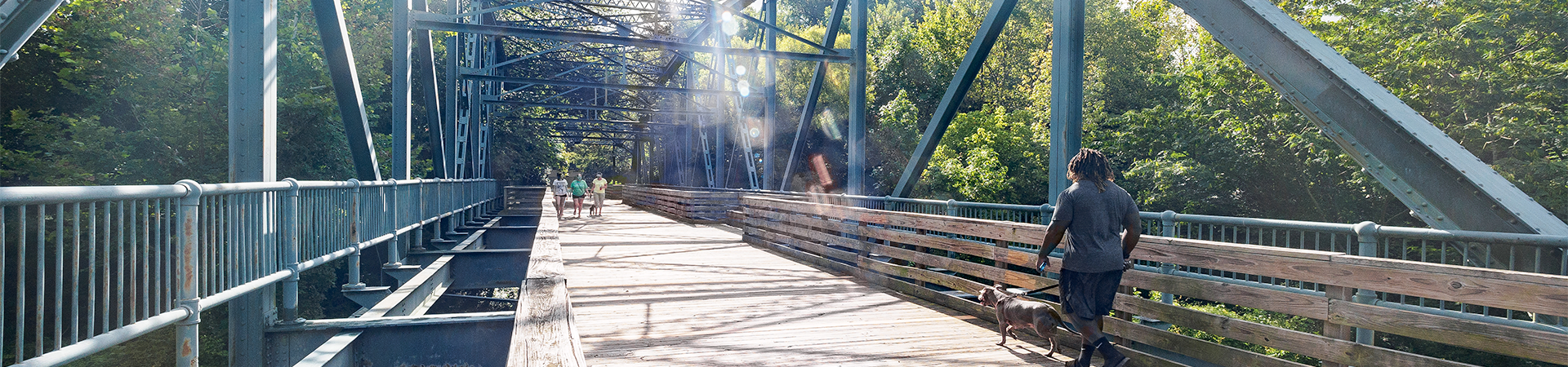 People on Greene Street pedestrian bridge