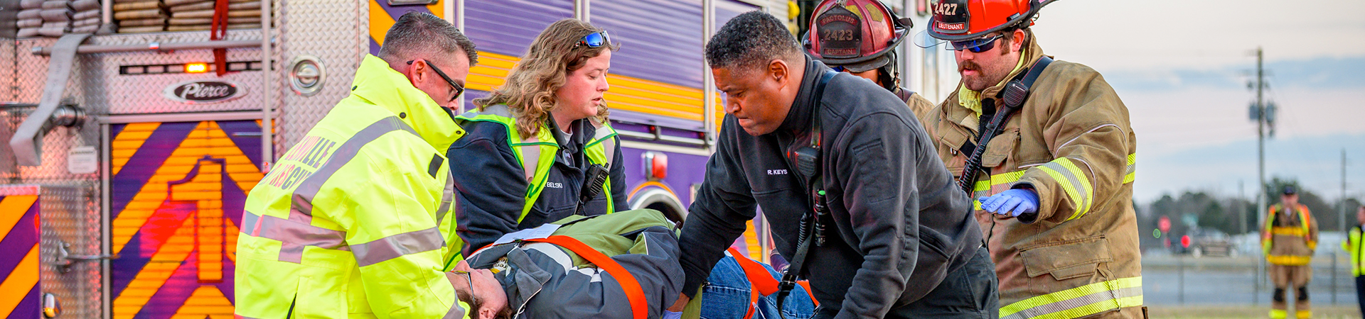 EMS workers helping patient